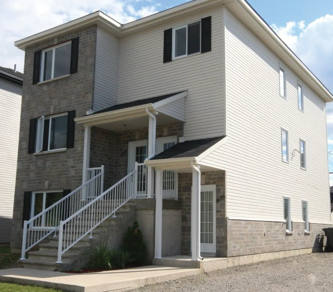 Duplex brique et revêtement (photo à titre indicatif)