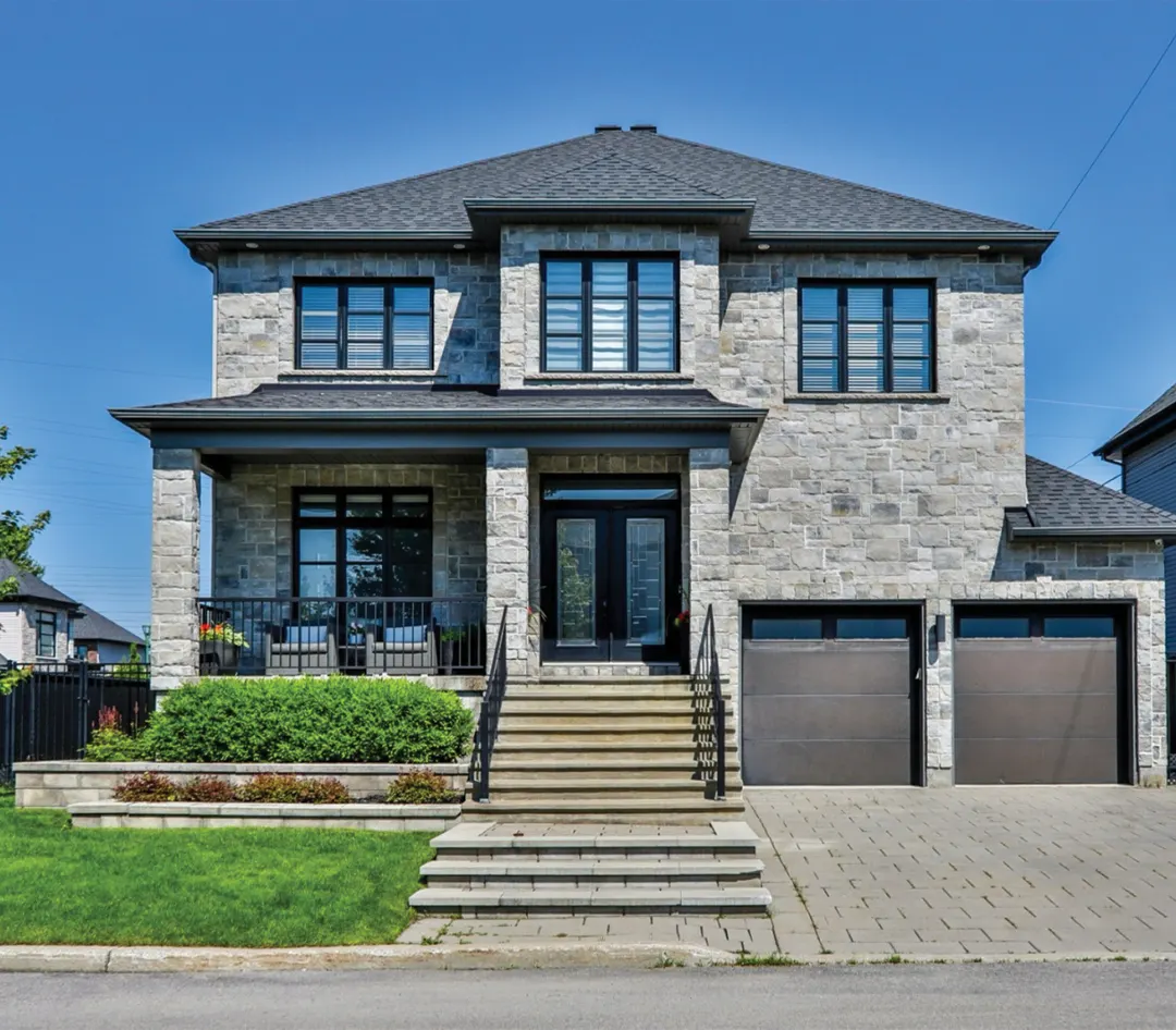 Maison en pierre avec garage double (photo à titre indicatif)